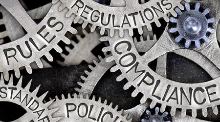 gears labelled rules, regulations, standards, policies, and compliance