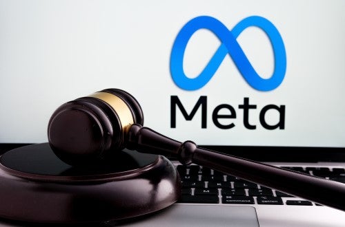 image of a gavel with the meta logo above it