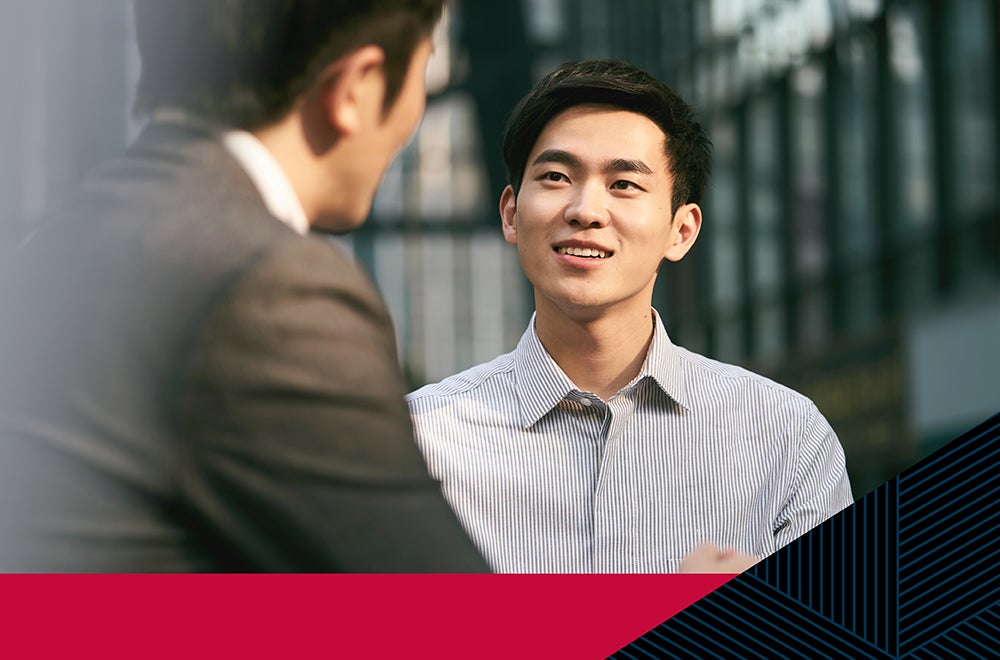 Mentor and mentee chatting