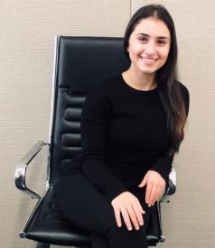 Photo of Jasmin Mantoufeh sitting on a chair